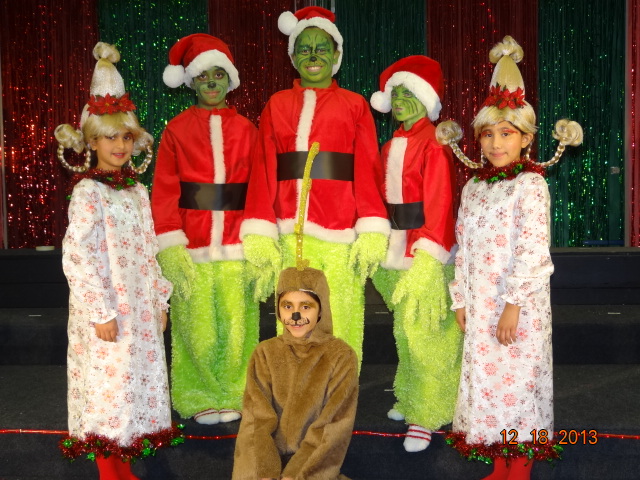 6 students dressed as characters from the grinch steals christmas