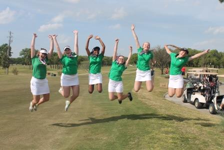 Golf team of smith high school jumping in the air