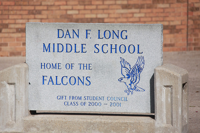 concrete block that says Dan F. Long Middle School Home of the Falcons.  Gift from Student Council Class of 2000-2001