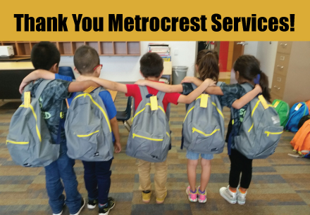 Kids with their kid friendly backpacks from metrocrest services. Text says "Thank you Metrocrest Services!"