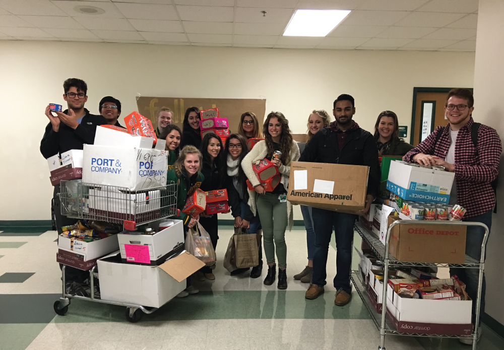 The Newman Smith Leadership class helped run a food drive collection during the week of 11/28-12/2 with over 1,500 food items donated by staff and students. All items will be delivered to the Metrocrest Social Services to help assist families in need right here in our community!
