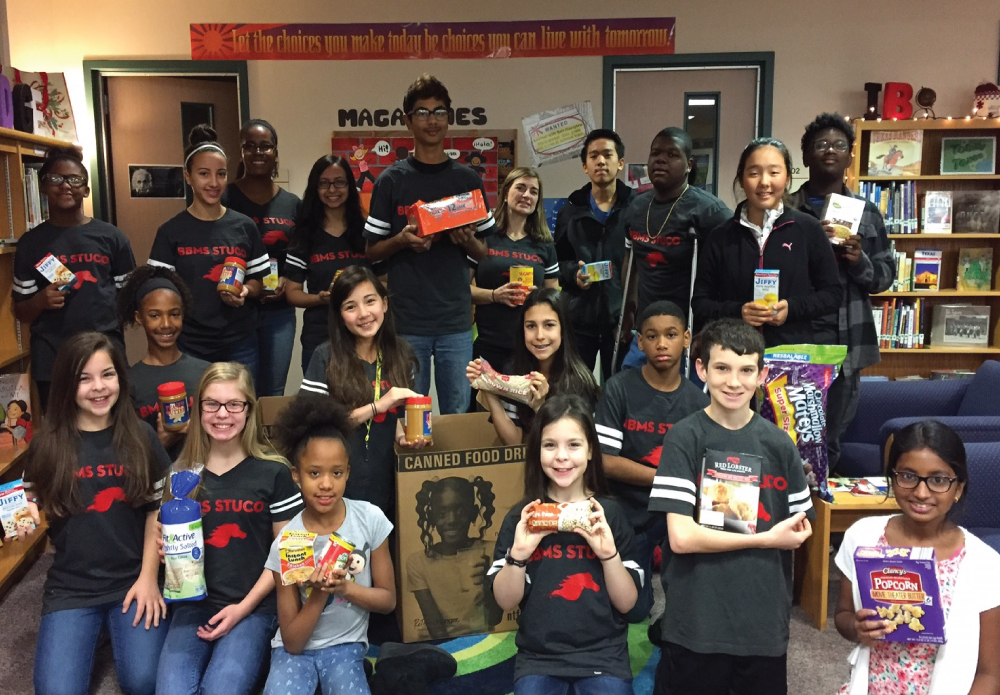 The Student Council at Barbara Bush IB World School have been hard at work collecting food for the North Texas Food Bank. By making daily announcements and having a grade level challenge, the students collected 200 food items to deliver just in time for the holiday break. The fine arts department made extra challenges to their students to bring in food items. An online donation campaign was also set up so that parents and community members could go online and donate in the name of Barbara Bush Middle School. Thanks to all who participated in this drive, and thanks to the Student Council for completing some excellent service to their community!