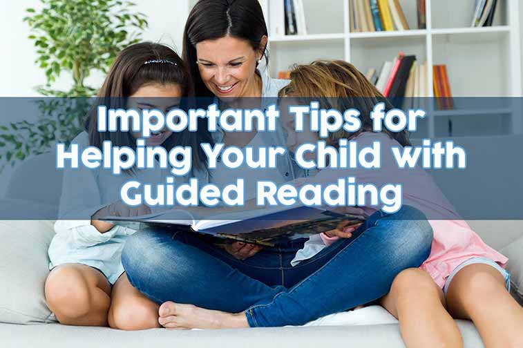 mother on couch with two young girls reading a book