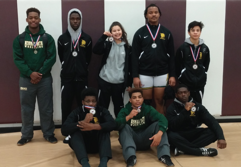 The Trojans closed out 2016 on a high note.  All ten wrestlers that competed in the tournament won at least one match while 8 of 10 came home with medals.  In the JV boys’ brackets, Jamel Scott took home a bronze and Darian Dozier received a gold for his first place performance.  In the girls’ tournament, junior Barbie Sanchez went 2-1 on the day and took home a bronze medal.  As for the varsity boys, the Trojan numbers may have been small, but they were mighty.  All five of Smith’s varsity boys took home medals, and combined they scored 64.5 team points to finish 5th out of 12 teams.  With only five out of fourteen weight classes represented, that is quite an accomplishment!  The Trojan boys wrestled tough from start to finish.  Freshman Anthony Machorro took home the bronze at 106.  All three seniors, Tyrese Lewis (152), Chris Conway (182), and Jonathan Johnson (285), placed second in their brackets.  The lone Smith champion was sophomore Kendall Iwuagwu who pinned his opponent in the 195 pound class. This final tournament of 2016 has started the wheels in motion for a great district season starting on January 5 at home versus Lovejoy and McKinney North. The wrestling program would like to wish everyone a happy holiday break, and we’ll see you next year!
