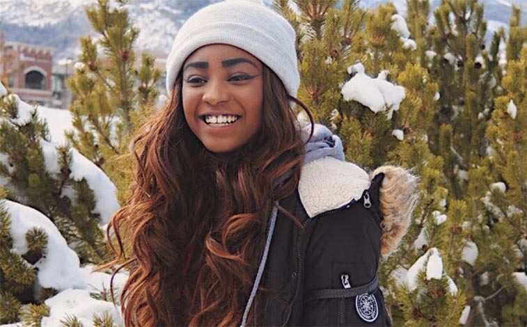 student standing in snow at sundance