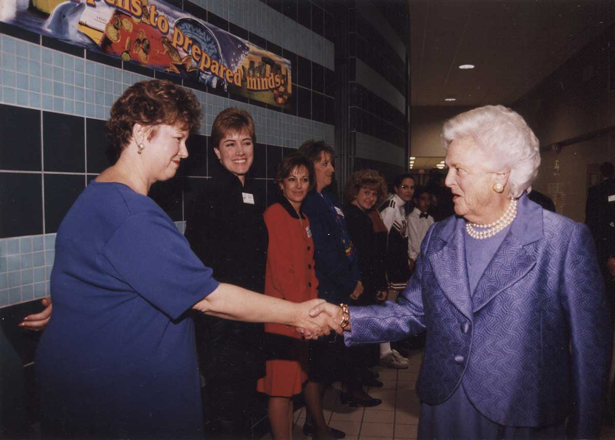 Former School Board Member, Lynn Chaffin, shakes hands with Former First Lady, Barbara Bush, at Barbara Bush Middle School. November 16, 1998.