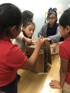 students constructing a marble run