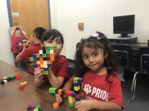 kids create block towers