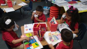 Students reading into microphones